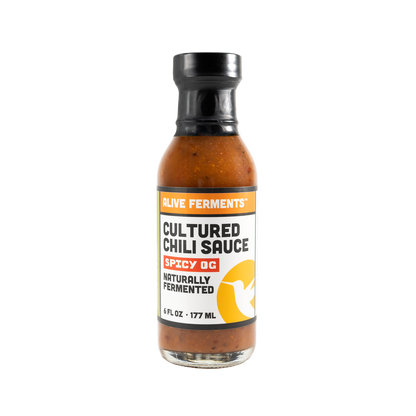 Bottle of Cultured Chili Sauce on a white background